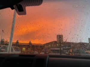 Photograph through a windshield of a rainstorm in Phoenix